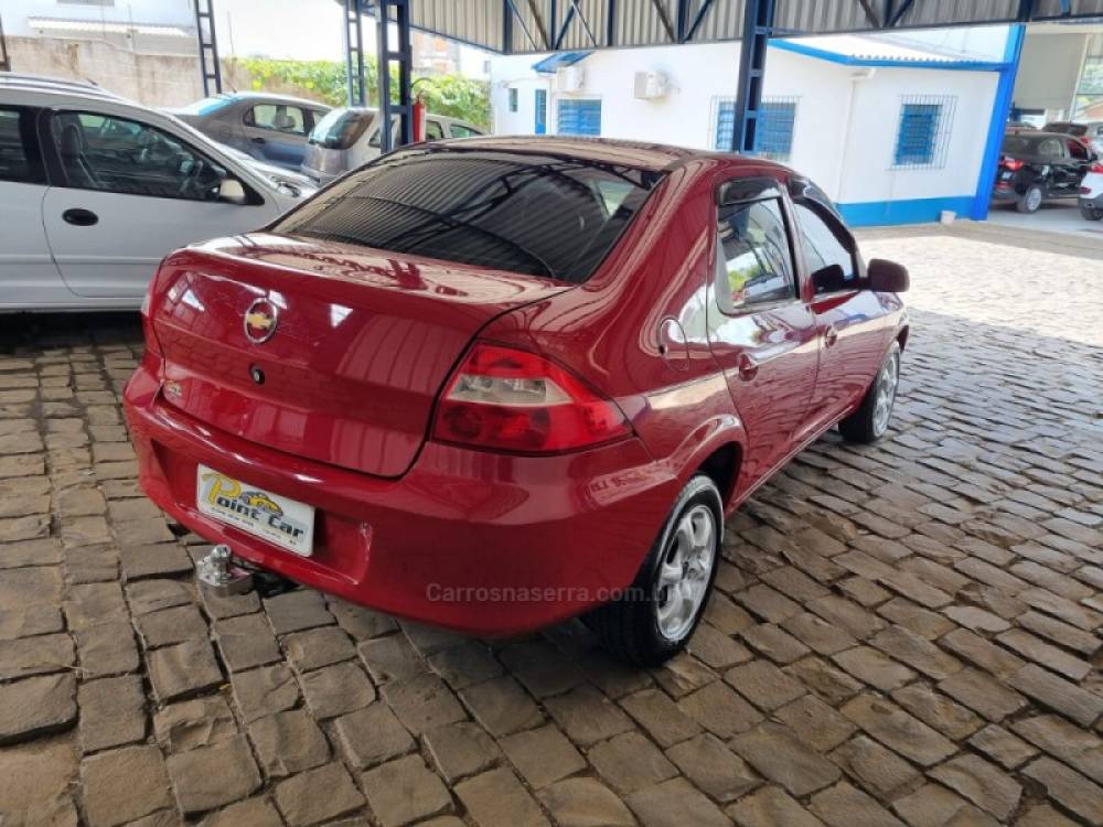 CHEVROLET - PRISMA - 2010/2011 - Vermelha - R$ 26.500,00