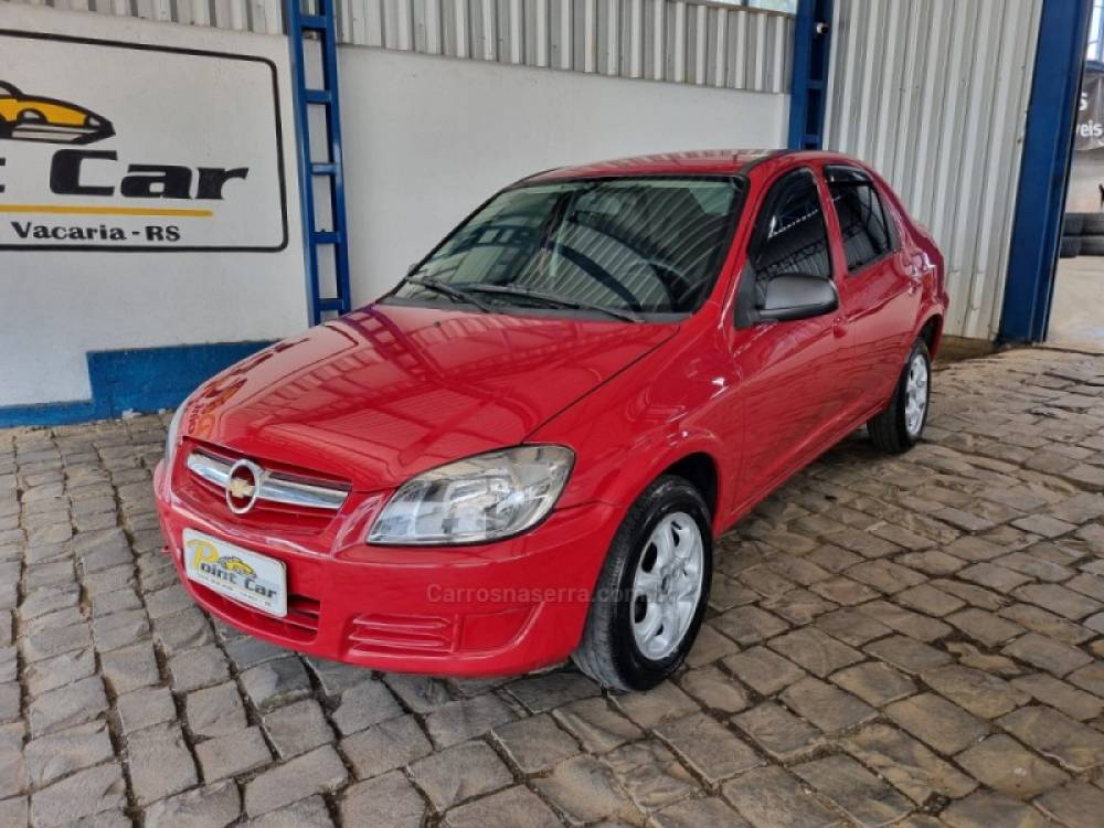 CHEVROLET - PRISMA - 2010/2011 - Vermelha - R$ 26.500,00